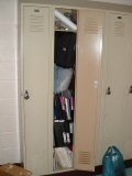 Tall locker stuffed with music, etc.